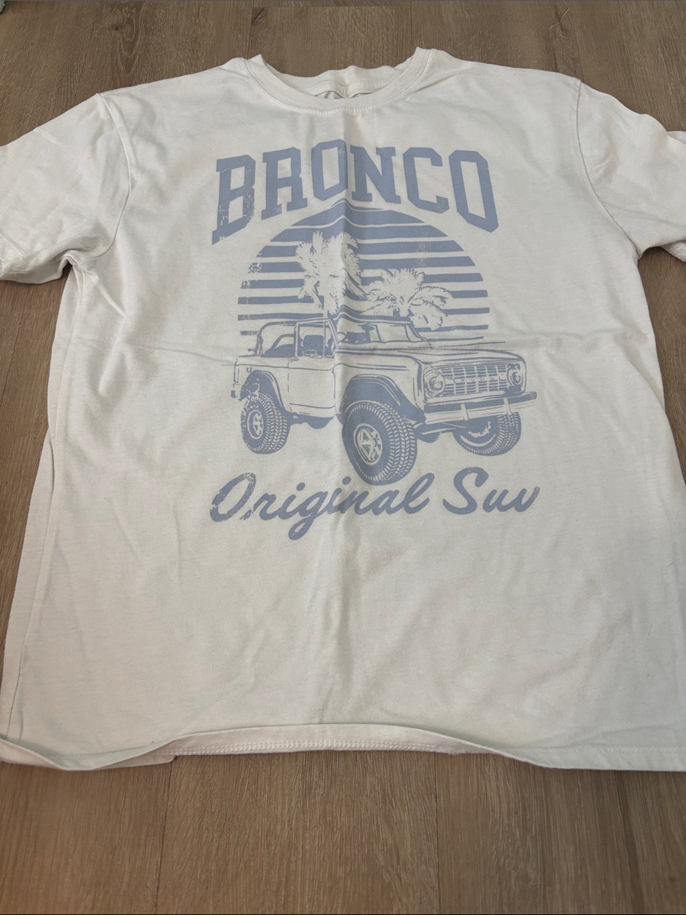 Ford White Tee with Light Blue Bronco Graphic and Text